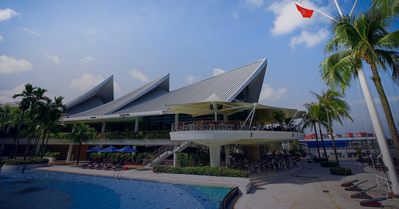 Pool and clubhouse at Republic of Singapore Yacht Club