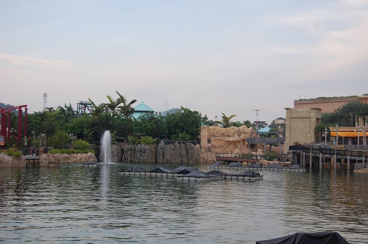 Lake and themed lands at Universal Studios Singapore, Resorts World Sentosa, seen from across the water