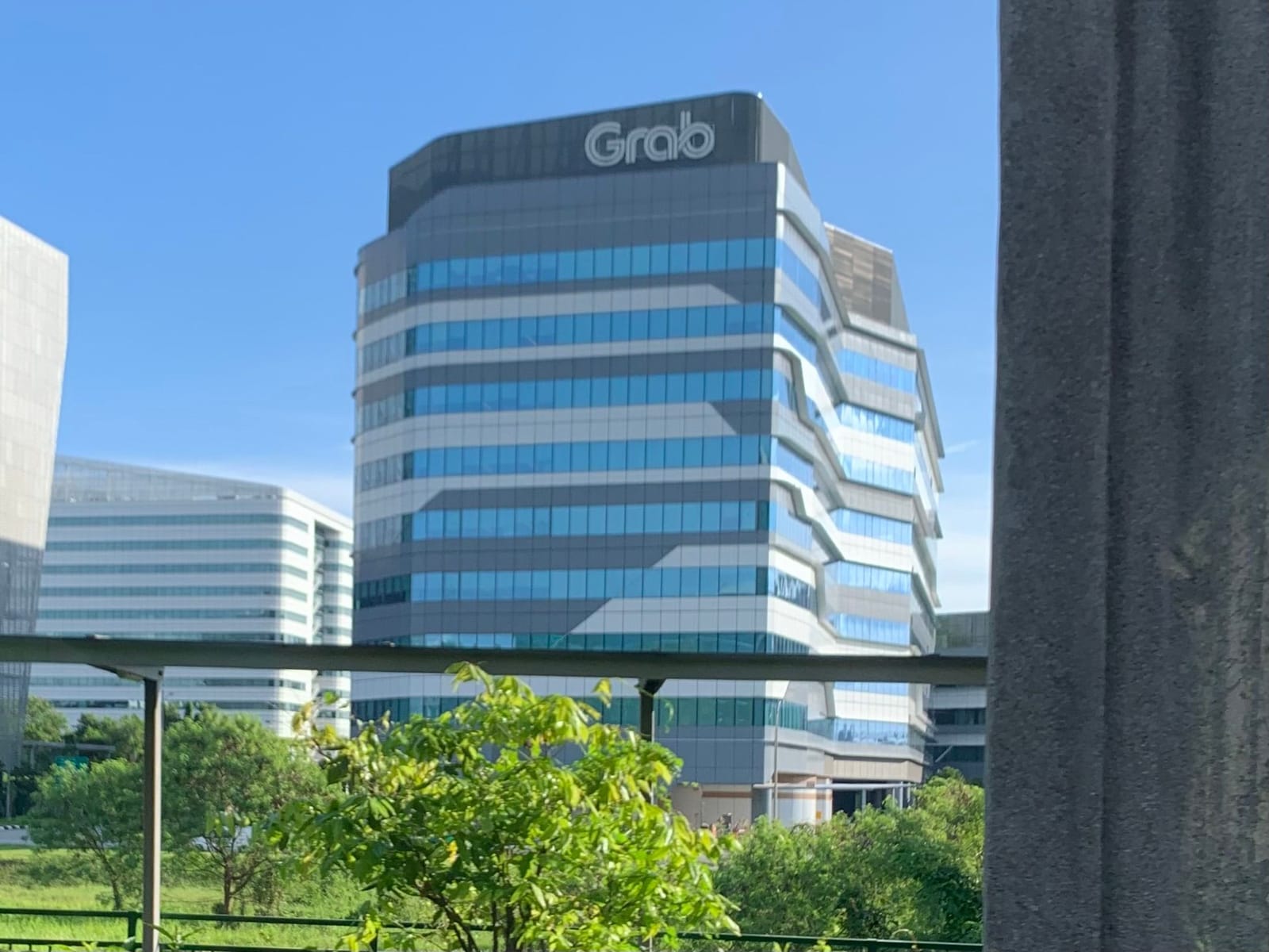 Exterior view of the Grab corporate headquarters building in Singapore